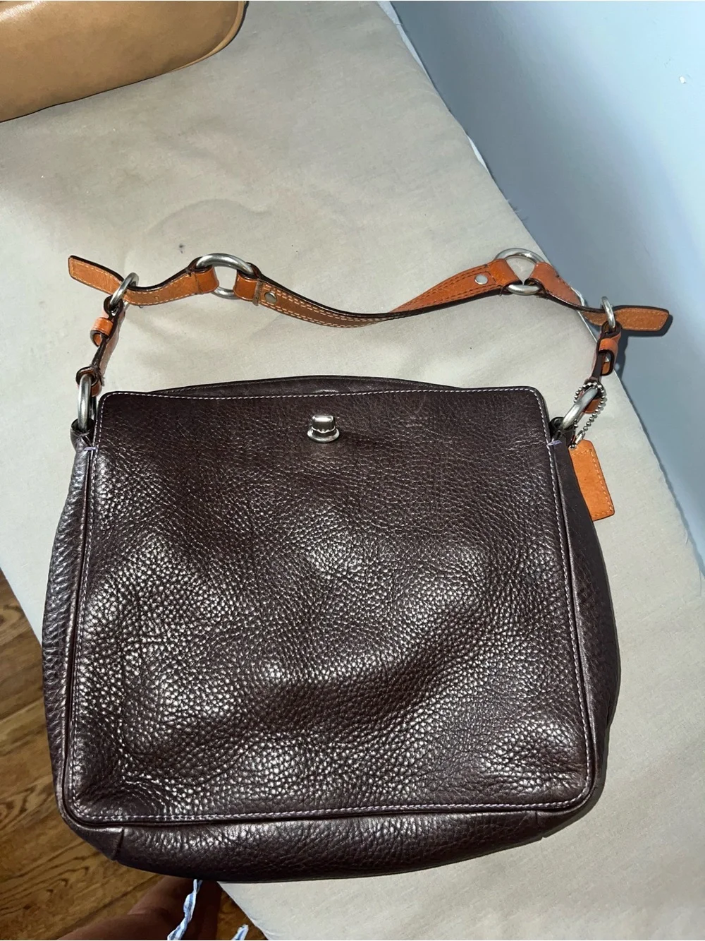 Coach Pebbled Leather Shoulder Bag in Dark Brown with Tan Strap